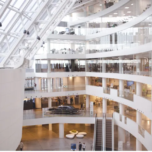 The bright multi-storey atrium of a shopping centre